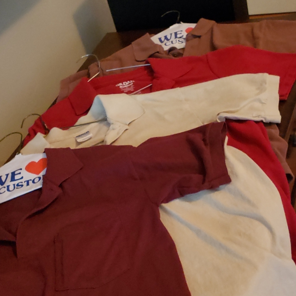 Four Gildan polos